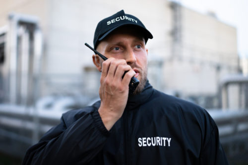 security officer guard man on walkie talkie