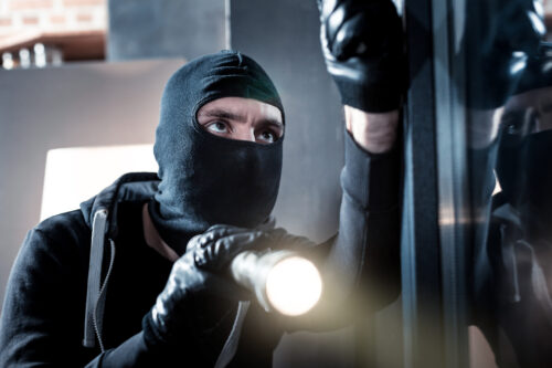 burglar breaking into home